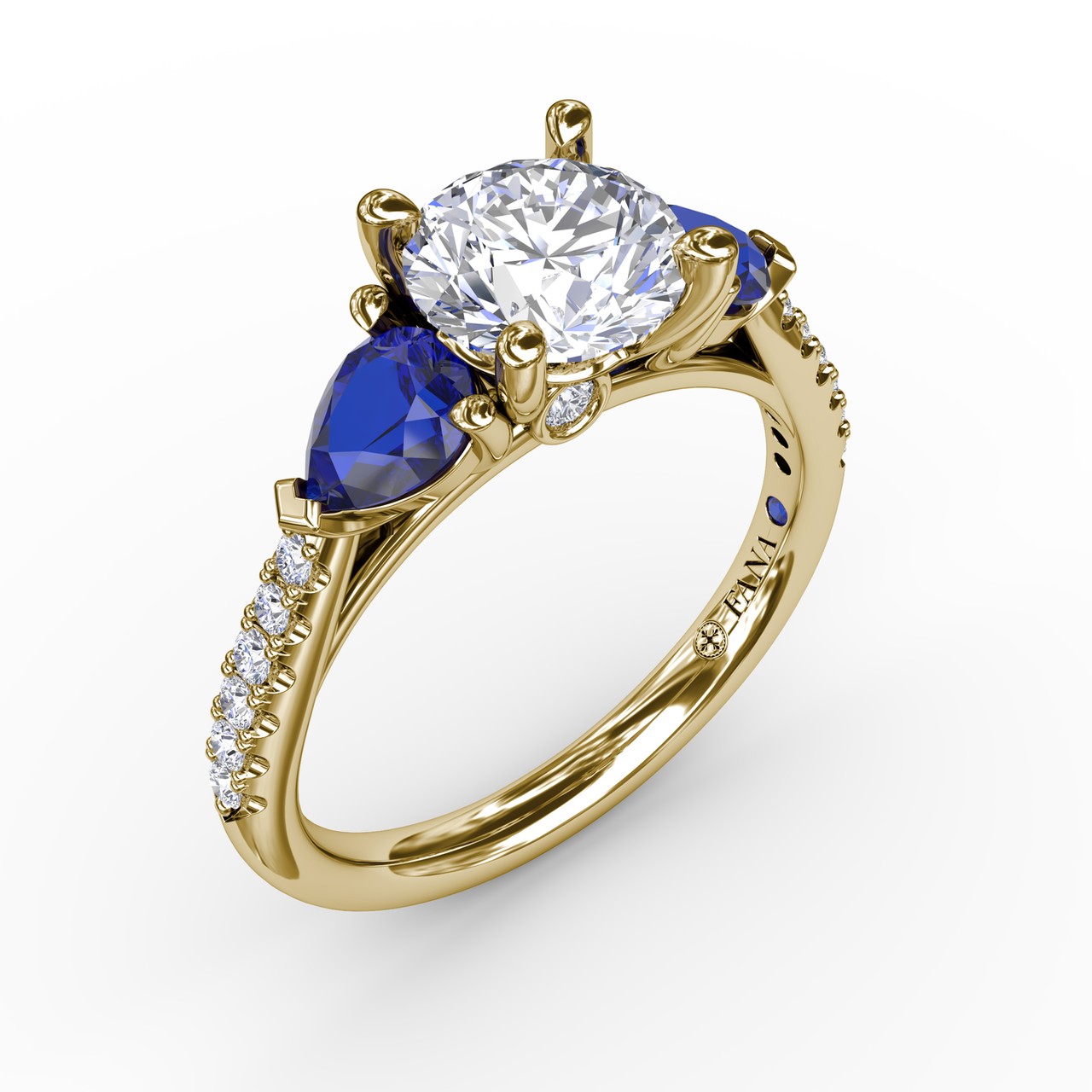 Elegant Pear Sidestone Ring in Sapphire